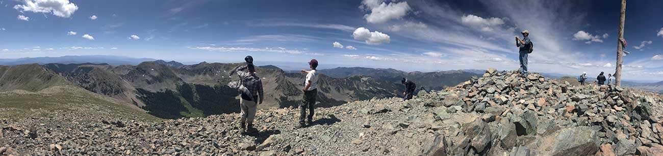 Hikers at the top of New Mexico's Wheeler Peak