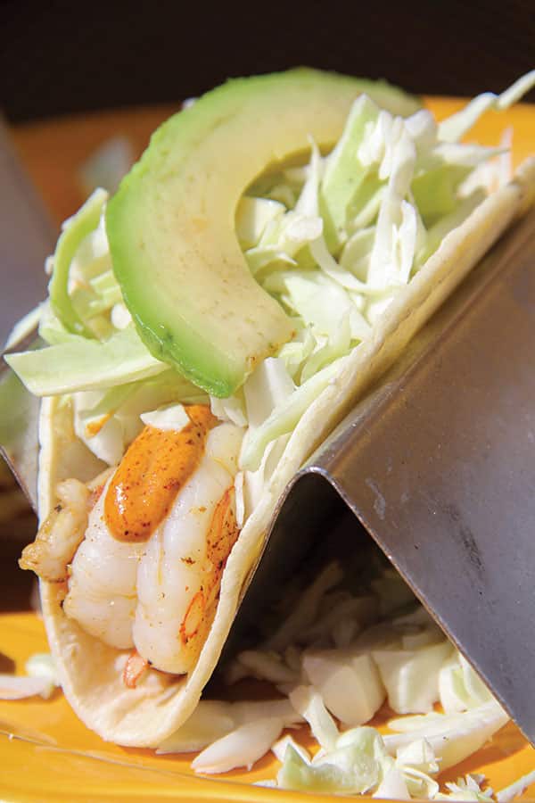 Seafood tacos with avocado.