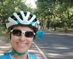 Ashleigh Curry with bike helmet