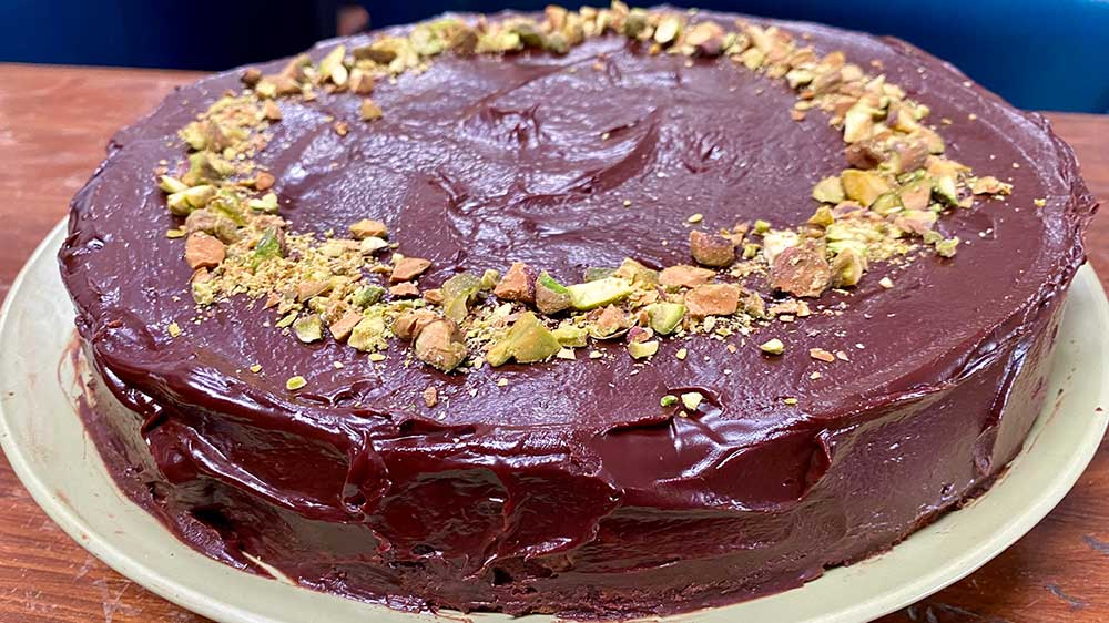 chocolate cake with pistachios on top