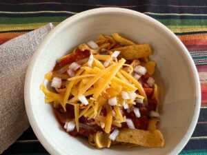 Frito Pie in a bowl, without lettuce.