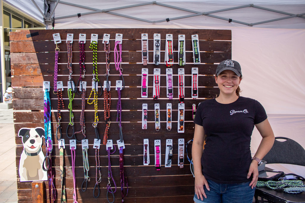 Kasey-owner-of-Gypsum-Co-infront-of-leashes