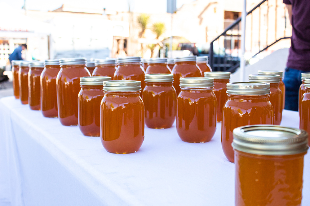 Shop local for jars of honey at the Las Cruces Farmers and Crafts Market.