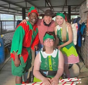 Ross Marks with cast members of "Santa's Cousin "during filming.