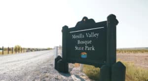 Mesilla Valley Bosque State Park sign at entrance to the park.